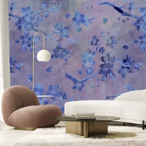 Fotobehang Gouden bloemen tegen een achtergrond van ruw grijs beton