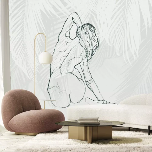 Fotobehang Een delicate schets van een vrouwenfiguur met bladeren op de achtergrond.