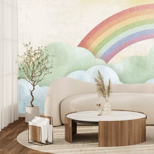 Fotobehang Een kleurrijke regenboog boven de zachte wolken