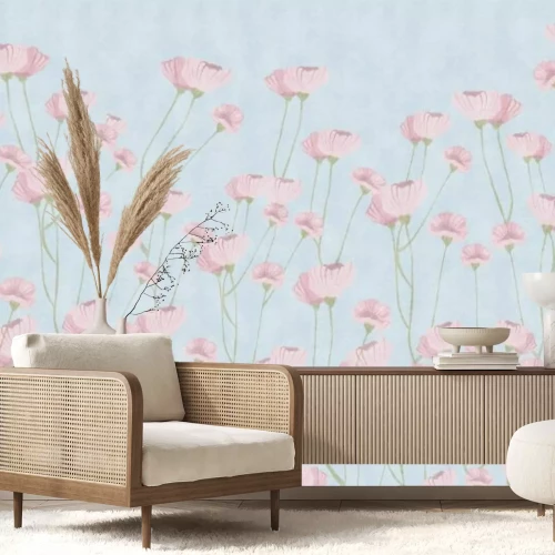 Fotobehang Delicate klaprozen op een blauwe achtergrond