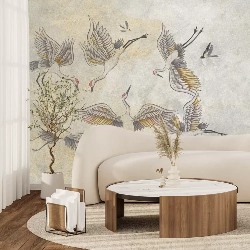 Fotobehang Kranen zweven boven een betonnen muur