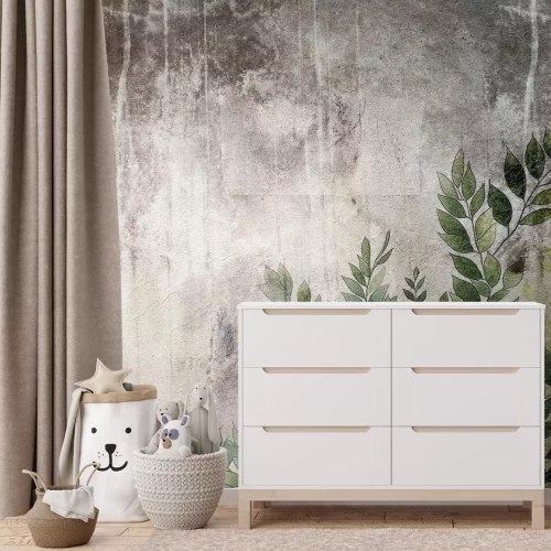 Fotobehang Bladeren op een betonnen textuurachtergrond