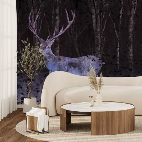 Fotobehang Winterbos met een hert op de achtergrond