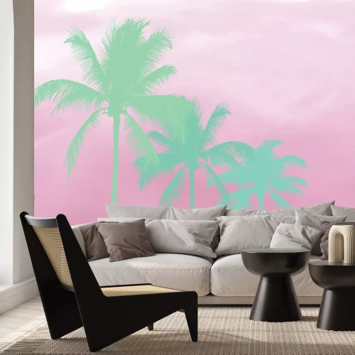 Fotobehang Schaduwrijke palmbomen op een pastelroze achtergrond