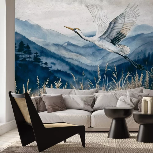 Fotobehang Een vogel tegen een bergachtergrond in aquarelstijl