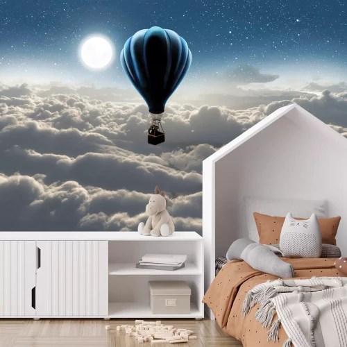 Fotobehang Een ballon met een olifant tussen de wolken