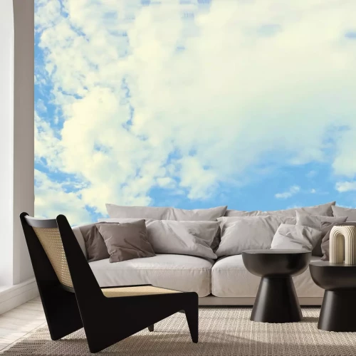 Fotobehang Blauwe lucht met fijne wolken