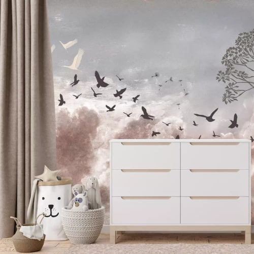 Fotobehang Een vogel en paardenbloemzaadjes tegen de lucht