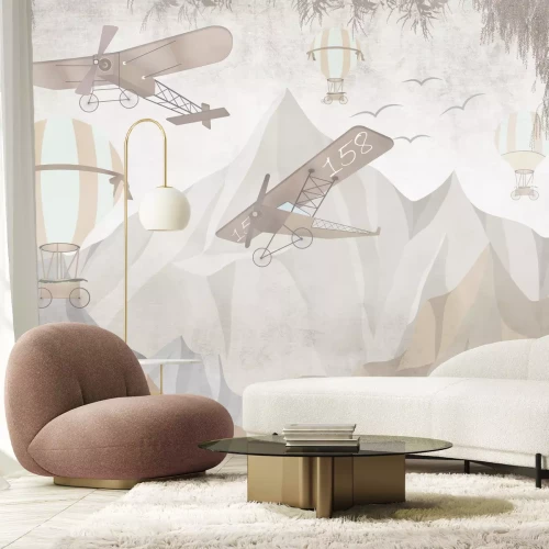 Fotobehang Vliegtuigen en ballonnen tegen de achtergrond van bergen