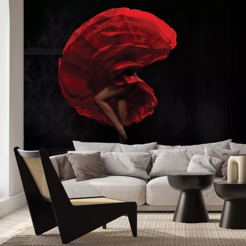 Fotobehang Een sensuele vrouw in een rode jurk die flamenco danst