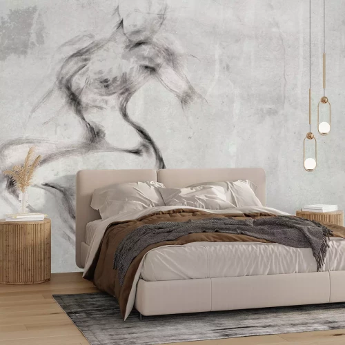 Fotobehang Een sensueel vrouwelijk silhouet tegen een grijze, betonnen achtergrond.