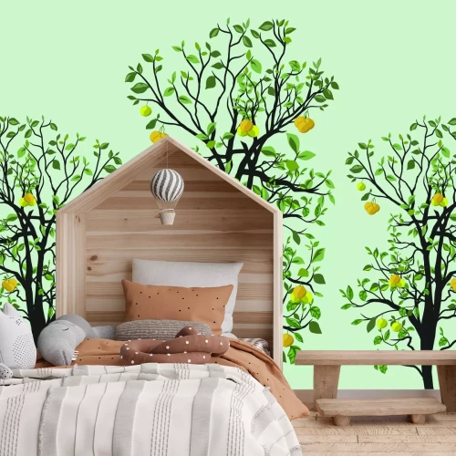 Fotobehang Citroenen hangen aan de takken van een boom met groene bladeren