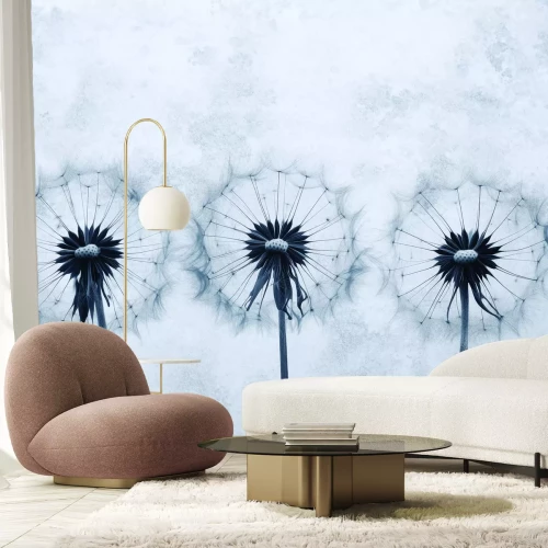 Fotobehang Grijze betonnen achtergrond met delicate paardenbloemen