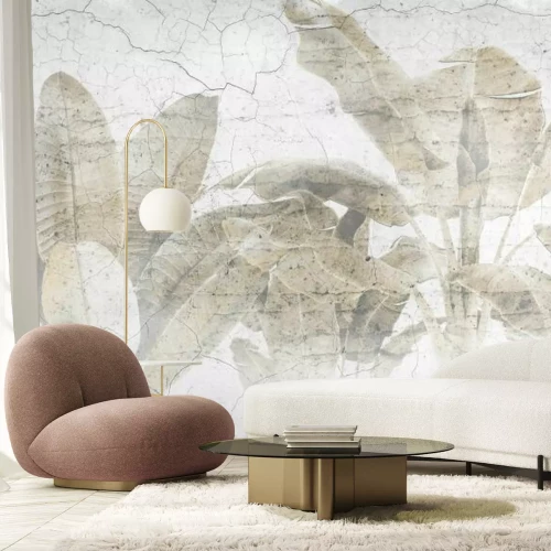 Fotobehang Palmbladeren op een betonnen muur