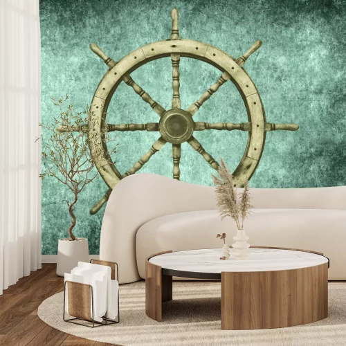 Fotobehang Een houten zeilroer rust op koel beton