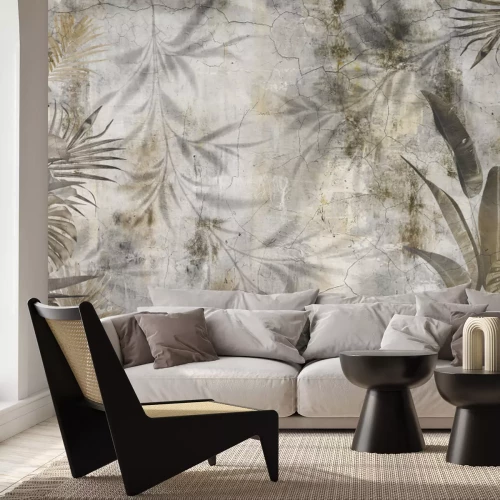 Fotobehang Exotische bladeren op betonnen natuur