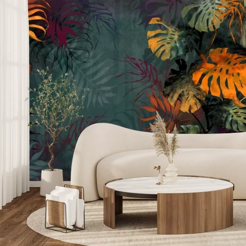 Fotobehang Kleurrijke monsterabladeren op een groene achtergrond