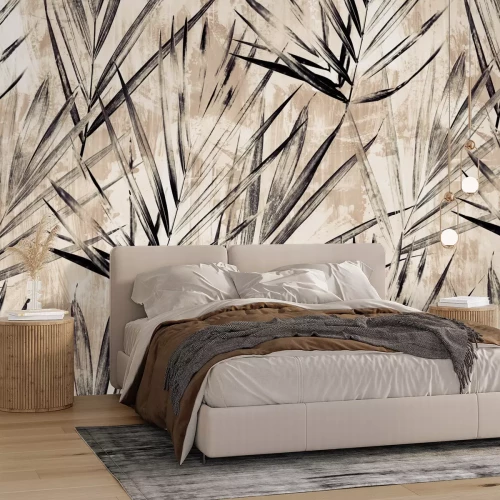 Fotobehang Zwarte palmbladeren op een beige muur