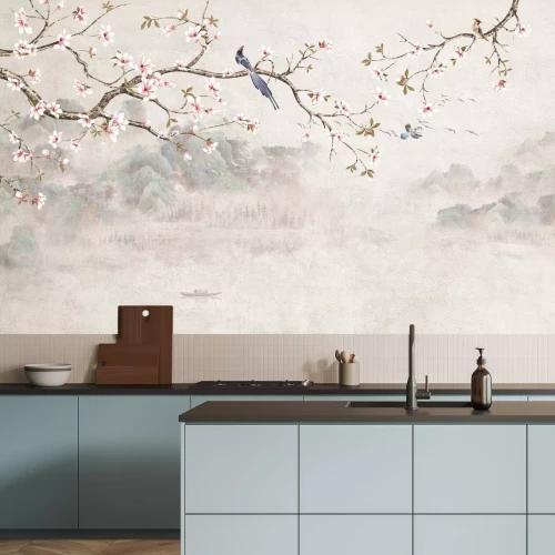 Fotobehang Een vogel op een kersentak met bergen en een meer op de achtergrond