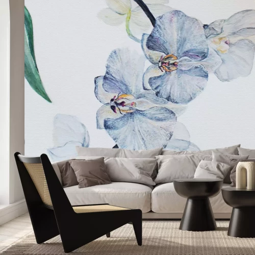 Fotobehang Blauwe orchidee tussen groene bladeren
