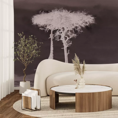 Fotobehang Een giraffe eet bladeren van een boom in Afrika