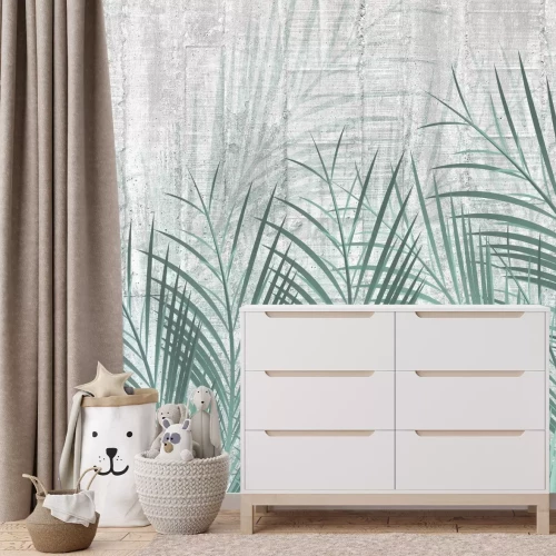 Fotobehang Groene palmbladeren op beton