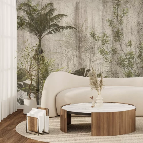 Fotobehang Palmbomen en groene bladeren tegen een betonnen achtergrond