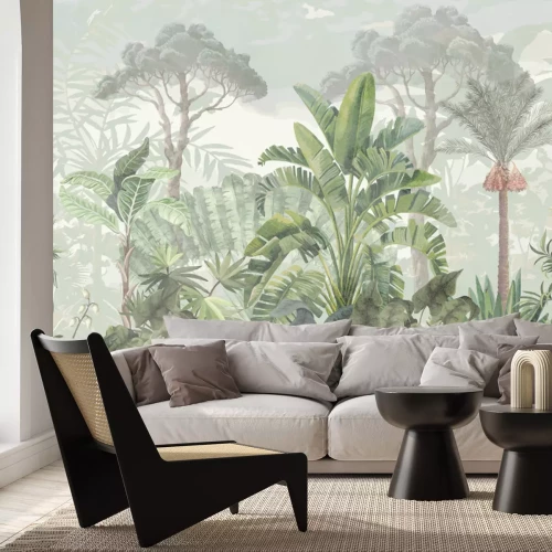 Fotobehang Tropisch bos met bananenbomen en grote bomen op de achtergrond