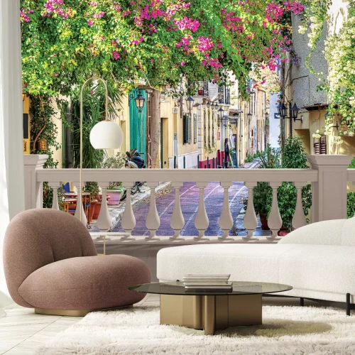 Fotobehang Een stenen straat omzoomd met bloemen in Toscane