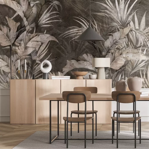 Fotobehang Tropische bladeren op een betonnen achtergrond in industriële stijl