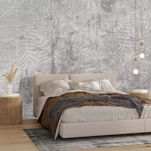 Fotobehang Tropische bladeren afgedrukt op een betonnen muur
