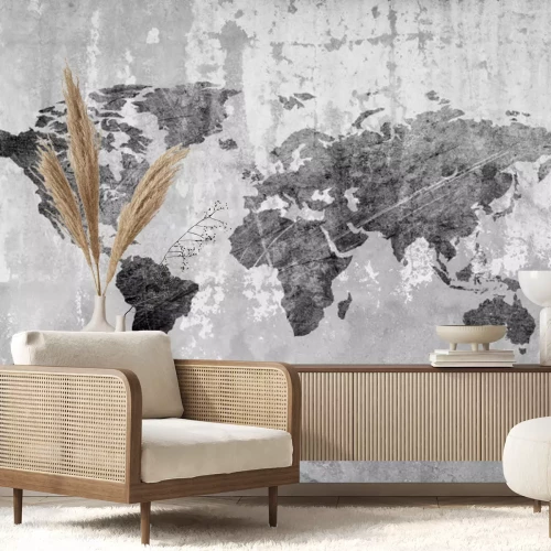 Fotobehang Een wereldkaart in monochrome kleuren op een verouderde achtergrond