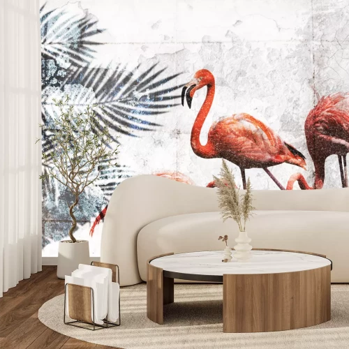 Fotobehang Flamingo&#39;s en exotische bladeren op een betonnen achtergrond