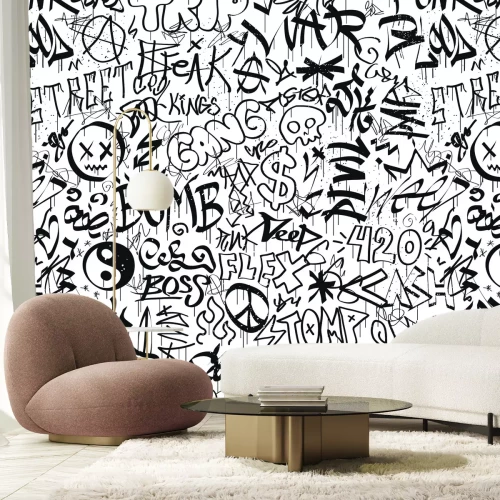 Fotobehang Monochrome graffiti met expressieve inscripties