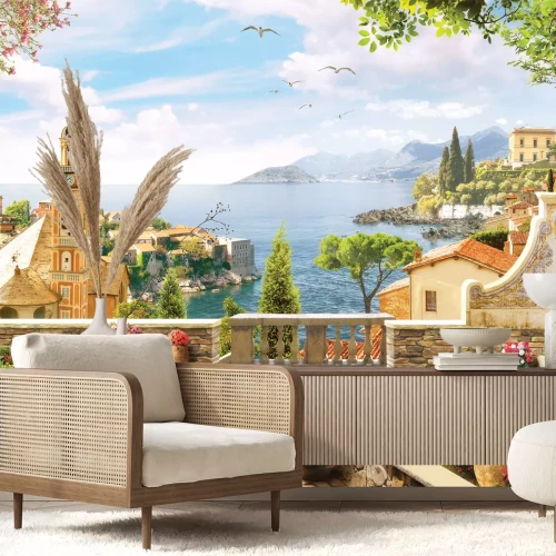 Fotobehang Een magisch landschap met een kerk tegen de achtergrond van de zee en de bergen