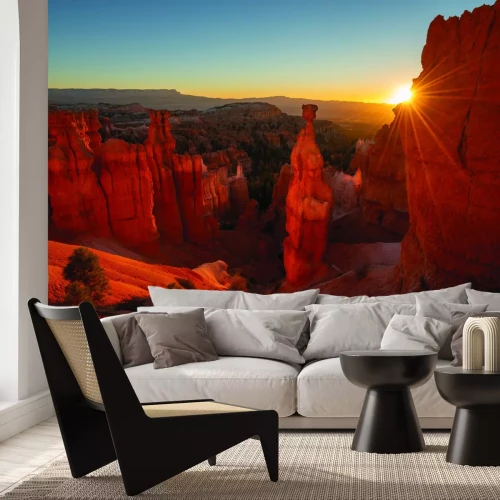 Fotobehang Woestijnrotsen in het licht van het zonlicht