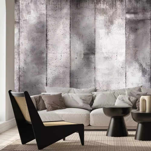 Fotobehang Een muur van grijze betonblokken