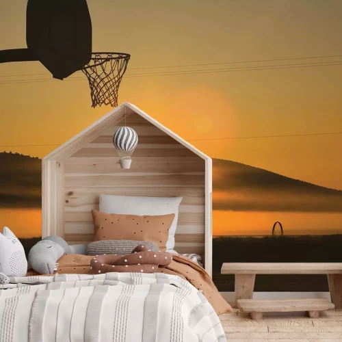 Fotobehang Basketbal in het zonsonderganglicht