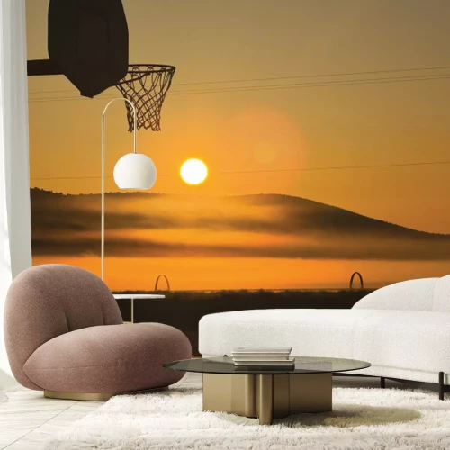 Fotobehang Basketbal in het zonsonderganglicht