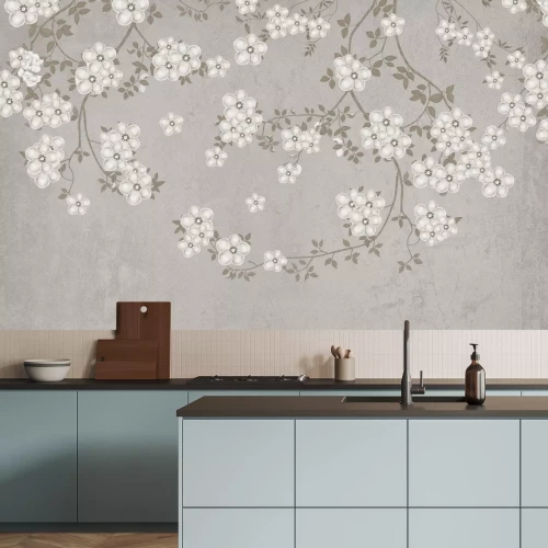 Fotobehang Takken met witte bloemen op beton