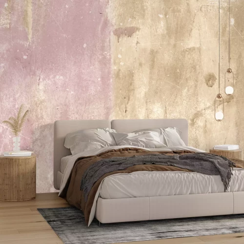 Fotobehang Beige en roze muur met schaafwonden en krassen