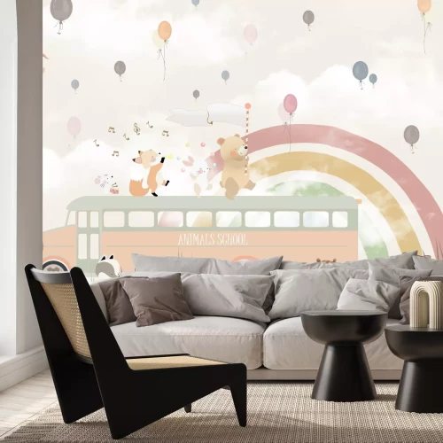 Fotobehang Schoolbus met dieren voor een regenboog