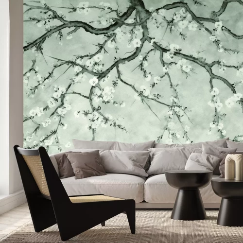 Fotobehang Zwart-witte takken met kersenbloesem