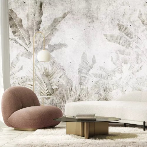 Fotobehang Palmbladeren op een betonnen achtergrond