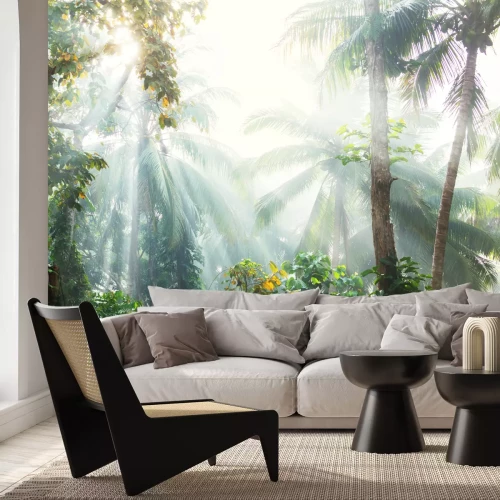 Fotobehang Zonnig palmbomenlandschap in een tropische jungle