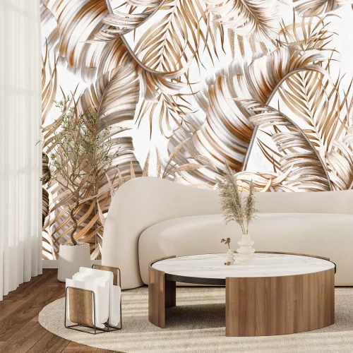 Fotobehang Tropische bladeren in beige- en bruintinten op een lichte achtergrond