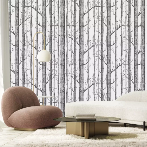 Fotobehang Slanke grijze bomen op een lichte achtergrond