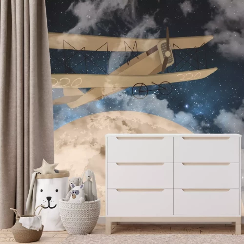 Fotobehang Een vliegtuig en een grote maan aan de sterrenhemel