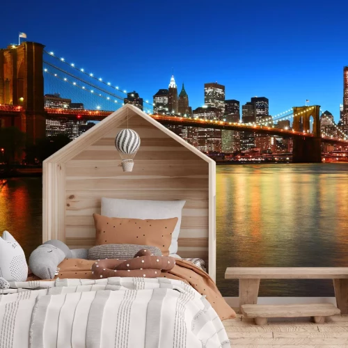 Fotobehang Brooklyn Bridge bij zonsondergang met de skyline van de stad