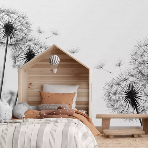 Fotobehang Zwarte paardenbloemen op een grijsachtige achtergrond